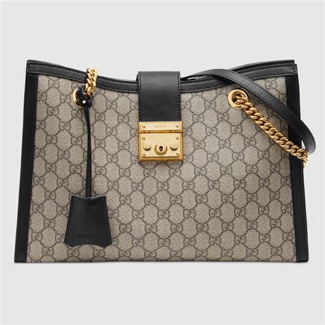 gucci supreme tian tote|GG Supreme Padlock Medium Shoulder Bag With Black Details.